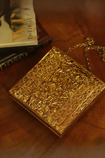 Gold embellished brass clutch for women