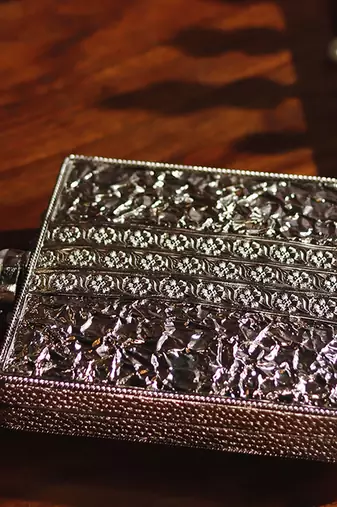 Silver beaded clutch with detachable chain