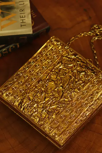 Gold embellished brass clutch for women