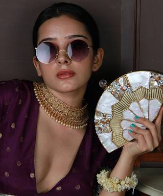 Embellished golden brass clutch 1