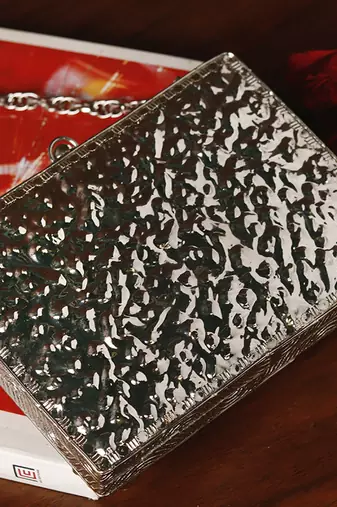 Silver beaded embellished brass clutch