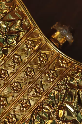Gold beaded embellished brass clutch golden