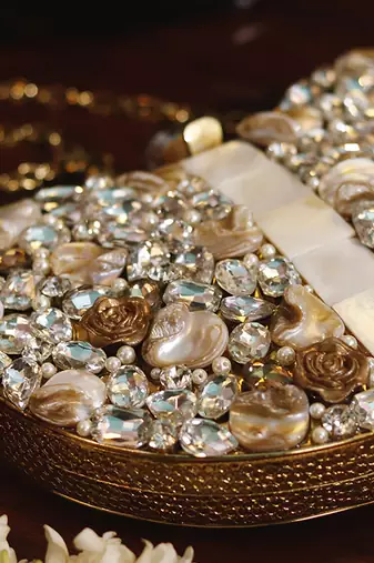 Gold beaded embellished brass clutch golden