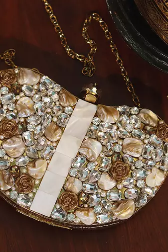 Gold beaded embellished brass clutch golden