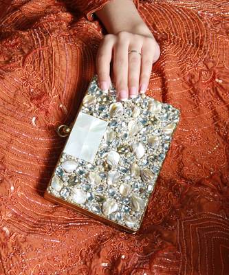 Gold brass clutch with bead work 1