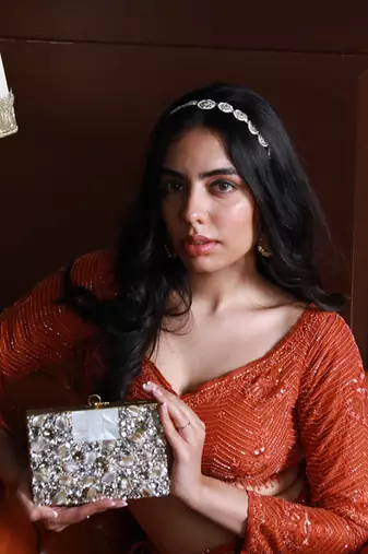 Gold brass clutch with bead work