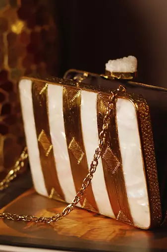 Gold clutch with detachable chain strap