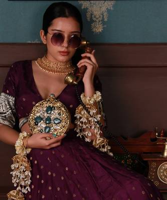 Gold beaded embellished brass clutch 1