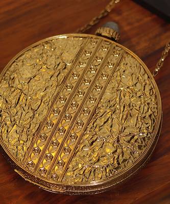 Gold beaded embellished brass clutch 2