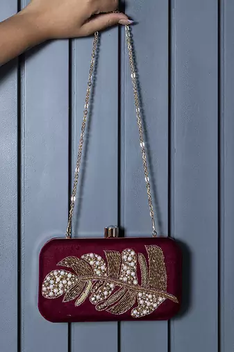 Red velvet hand embroidered leaf clutch