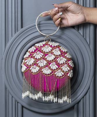 Pink silk hand embroidered clutch with tassles 1