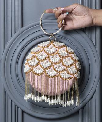 Pink hand embroidered silk clutch with tassles 1
