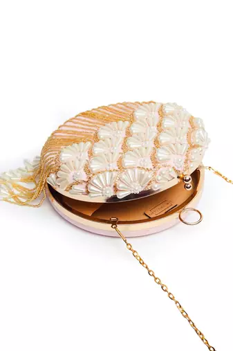 Pink hand embroidered silk clutch with tassles