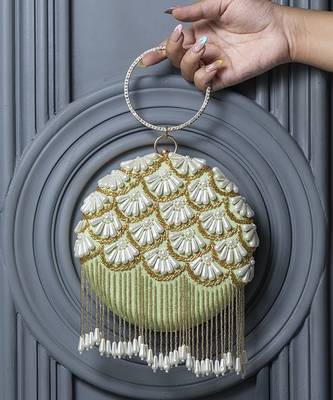 Green silk hand embroidered clutch with tassles 1