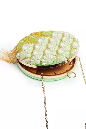 Green silk hand embroidered clutch with tassles
