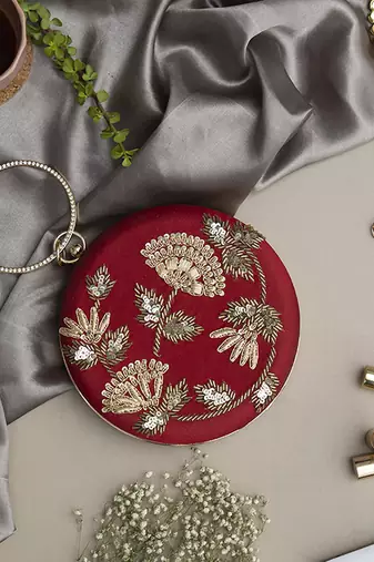 Hand embroidered red clutch