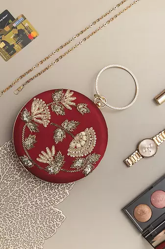 Hand embroidered red clutch