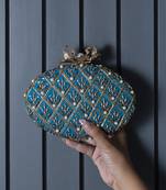 Blue hand embroidered silk clutch