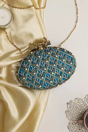 Blue hand embroidered silk clutch
