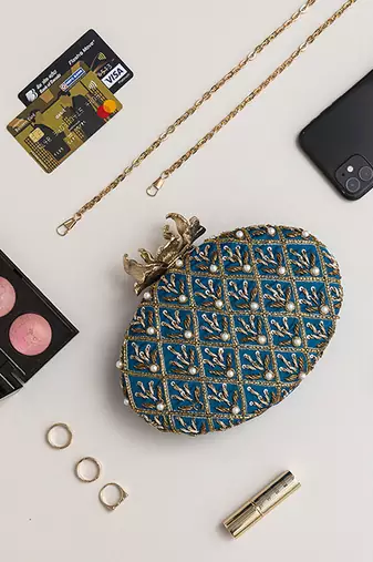 Blue hand embroidered silk clutch