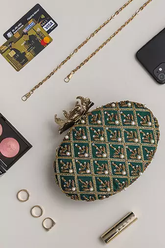 Green hand embroidered silk clutch