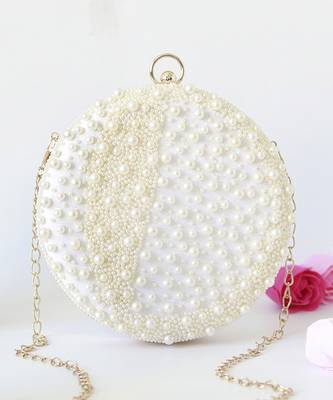 White hand embroidered clutch with pearl details 1