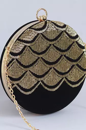 Gold silk clutch with hand embroidered details