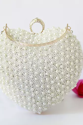 all white pearl hand embroidered heart clutch