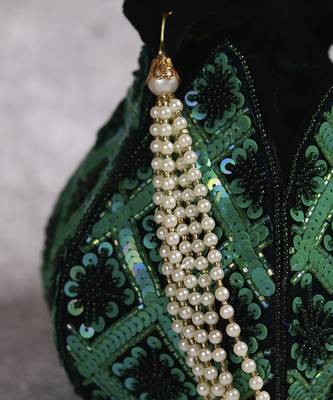 Green velvet hand embroidered lotus potli 4