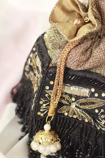 Black silk hand embroidered half lotus potli