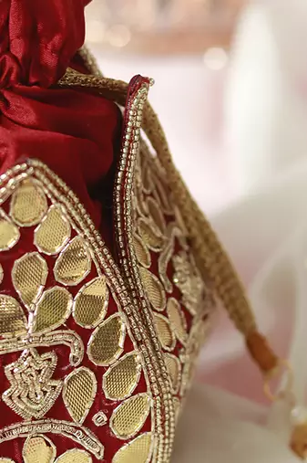 Red silk gotapatti handwork mini lotus potli