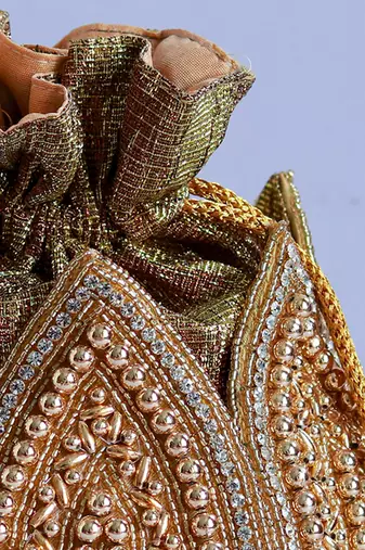 Gold hand embroidered silk lotus potli