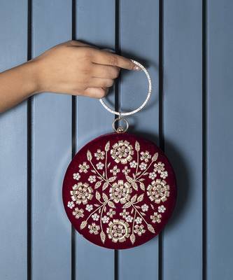 Red silk hand clutch with embroidery details 1