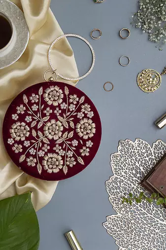 Red silk hand clutch with embroidery details