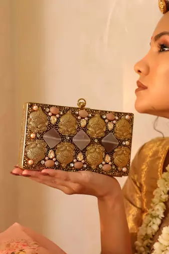 Gold embellished brass clutch with bead work