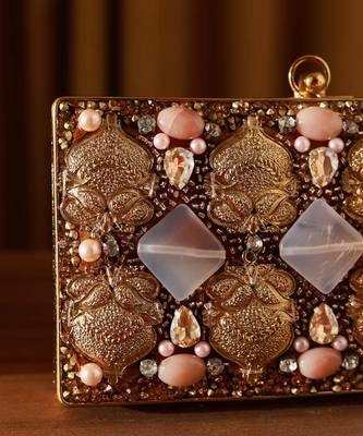 Gold embellished brass clutch with bead work 4