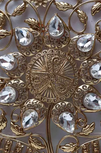 Gold intricate brass clutch