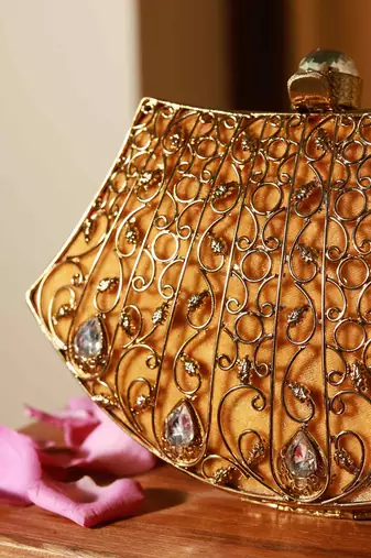 Gold embellished brass clutch