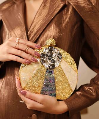 Gold round clutch with detachable chain 5