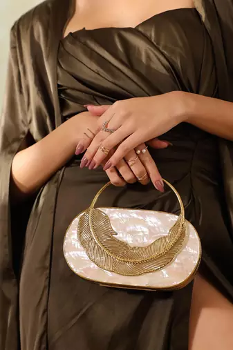Handcrafted gold clutch with removeable chain