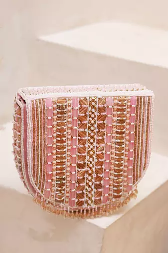 Pink suede flap over bag with handle