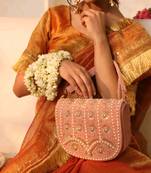 Pink suede bag with handle