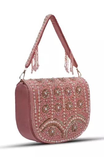 Pink suede bag with handle