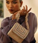 Beige suede mini bag with embroidered handle