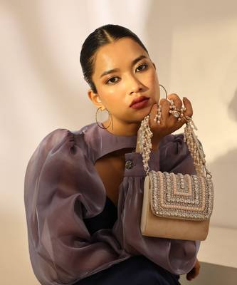 Beige suede mini bag with embroidered handle 3