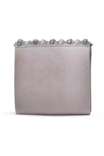 Beige suede mini bag with embroidered handle