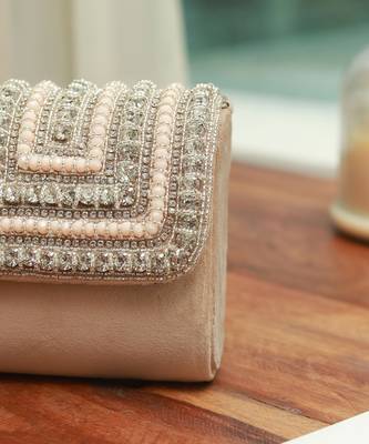 Beige suede mini bag with embroidered handle 5