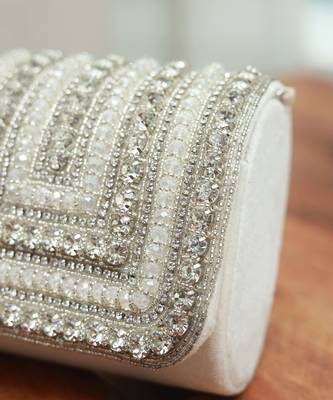 White suede mini bag with embroidered handle 4