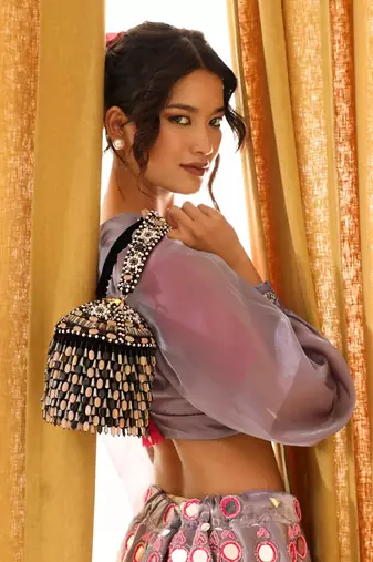 Black suede round embellished bag with handle