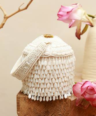 White suede round embellished bag with handle 1